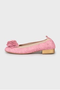 Pink ballet shoes decorated with flowers