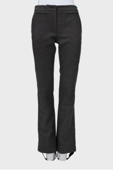 Gray trousers with straps