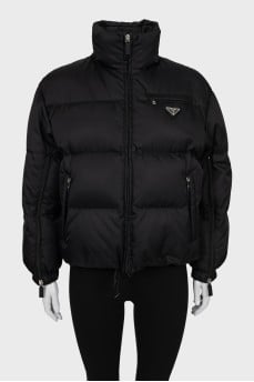 Black jacket with drawstrings at the bottom