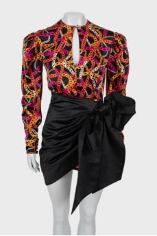 Silk dress decorated with a bow