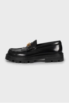 Leather loafers with gold detailing