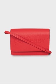 Rectangular crossbody bag in leather, with tag