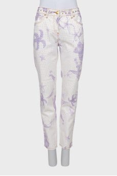Printed jeans decorated with rhinestones