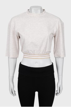 Beige top with lettering print