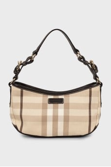 Bag made of textile and leather in a signature print