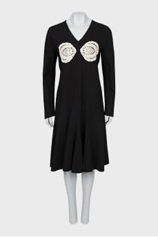 Decorated dress with long sleeves