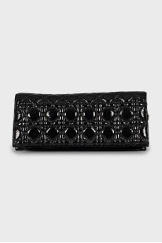 Leather clutch with branded decor