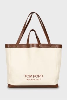 Bag with leather handles and signature print