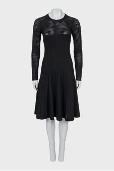 Fitted black dress with perforation