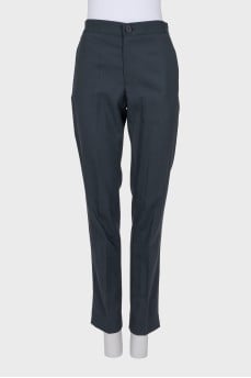 Grey tapered trousers with tag