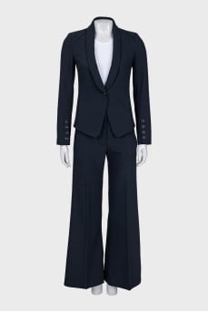 Suit with fitted jacket and wide trousers