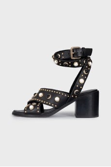 Black leather sandals with decor