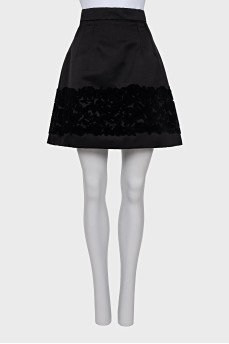 Black skirt with relief pattern