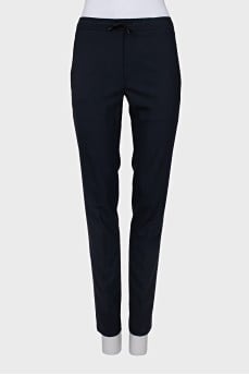 Blue tapered trousers with arrows