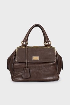 Leather bag with patch pockets