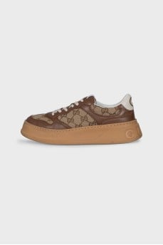 Sneakers with a signature print