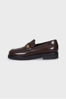 Brown leather loafers