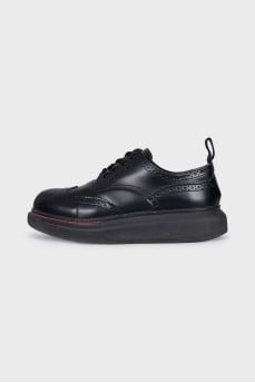 Black brogues with perforations