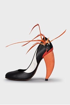 Shoes with feathers and a figured heel