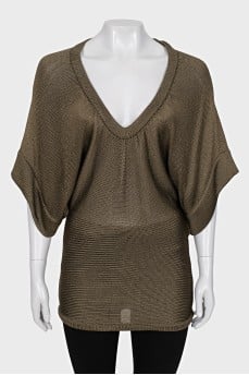Knitted sweater with a loose fit