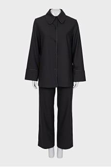 Black suit consisting of a shirt and trousers