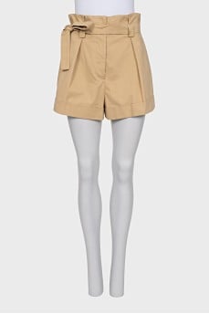 Beige shorts with a belt
