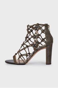 Leather heeled sandals with a braided upper