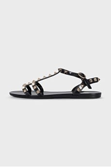 Sandals decorated with golden spikes