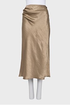 Gold skirt with tag
