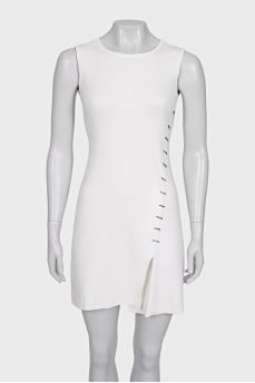 White dress with an asymmetrical side seam