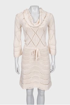 Knitted dress with an openwork pattern