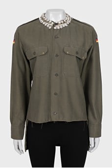 Asymmetrical shirt decorated with crystals