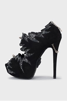 Shoes with a figured cutout and rhinestones