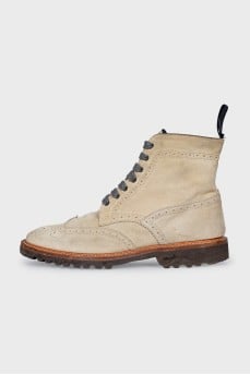Beige boots with perforations