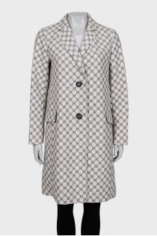 Straight-cut coat with a polka dot print