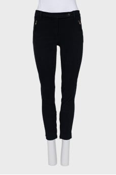 Slim-fit trousers with zippers