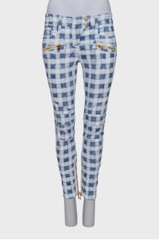 Plaid jeans with gold zippers