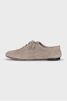 Suede shoes with embossed logo