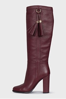 Pink boots with a tassel