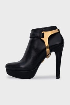 Leather ankle boots with gold decor