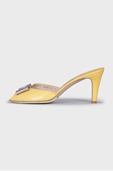 Yellow mules with silver decor