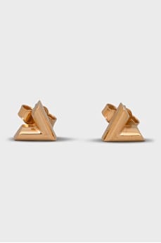 Golden earrings of a figured shape
