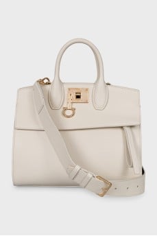 Leather bag with suede inserts