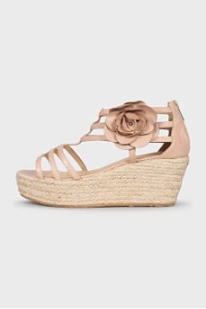 Leather sandals with a braided wedge heel