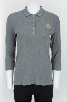 Gray polo with golden buttons