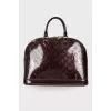 Alma Monogram Vernis bag