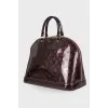 Alma Monogram Vernis bag