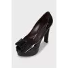 Patent leather shoes with embossed print