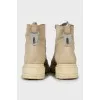 Suede boots with check print
