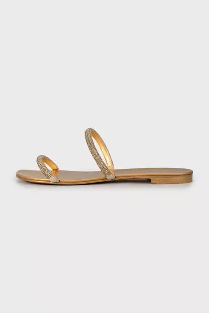 Golden slides decorated with rhinestones